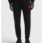 Cotton-terry tracksuit bottoms with red logo label