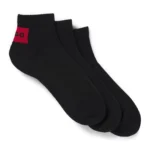 Three-pack of ankle socks with red logo labels