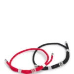 Two-pack of cord cuffs with logo plaques