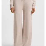 Melange-jersey tracksuit bottoms with logo plate