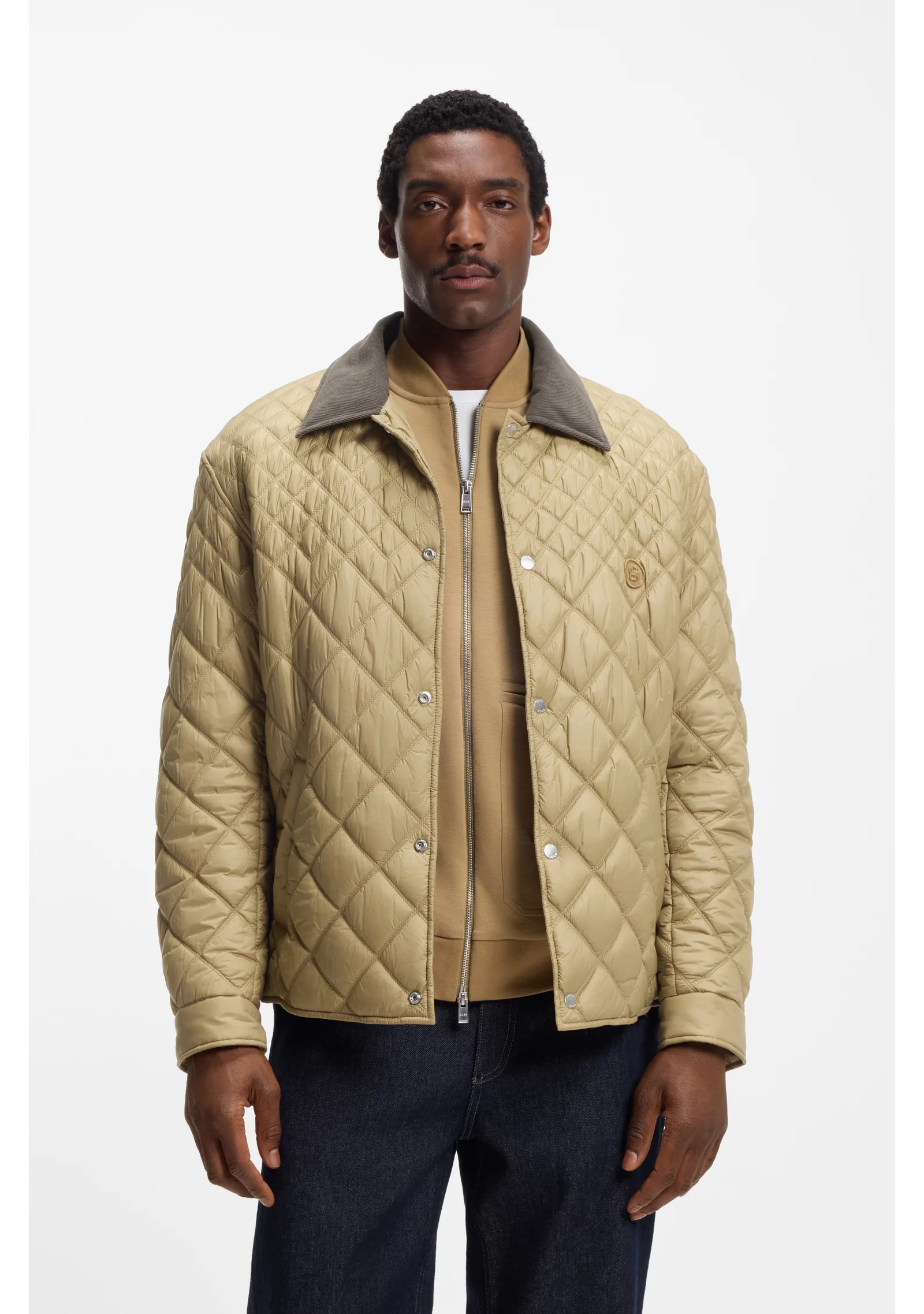 hbeu50558841_252_350 Water-repellent jacket with mixed quilting - Image 1