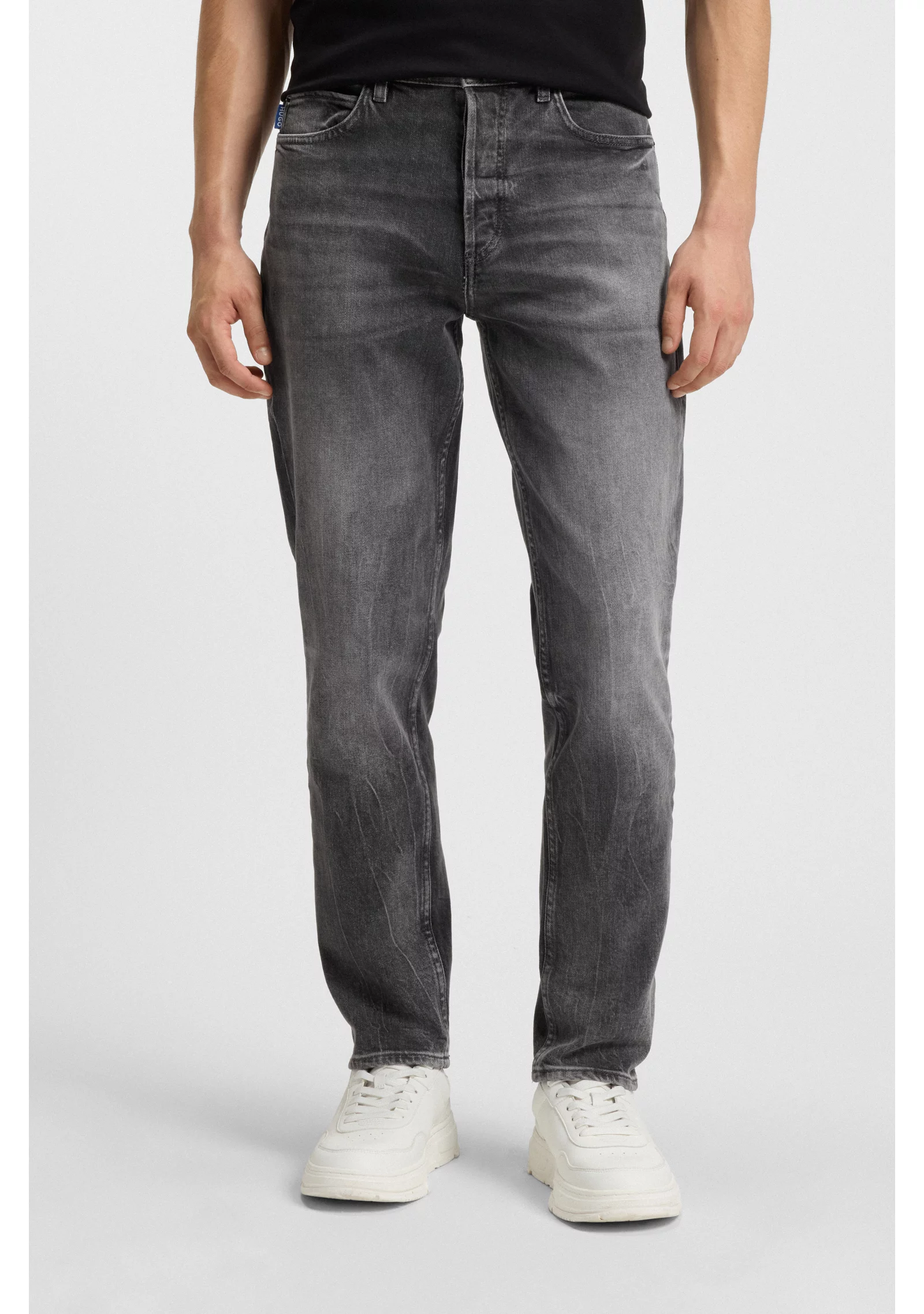 hbeu50529181_025_350 Tapered-fit jeans in dark-grey stretch denim - Image 1