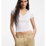Short-sleeved sweater in stretch fabric with polo collar