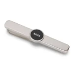 Brass tie clip with round logo detail