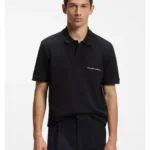 Polo shirt in cotton piqué with logo detail