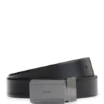 Reversible leather belt with pin and plaque buckles