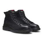 Half boots in leather with textured panels