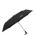 Monogram-canopy pocket umbrella in black and gold