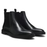 Chelsea boots in polished leather with signature stitching, Black